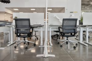 Office chairs at two adjacent workstations
